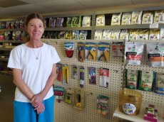 Debbie Spencer, owner of Pet Food Warehouse, recently moved her business to Beacon Woods Plaza. [Photo by Phyllis Day]
